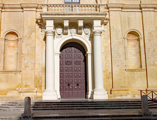 The grand doorway to the Cathedral in Valletta, Malta