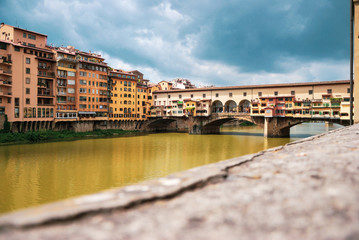Fototapeta na wymiar Dramatic exposure fusion shot of the famous Ponte Vecchio in Florence, Italy