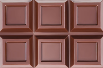 Chocolate bar closeup on white background.