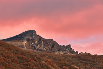 view of the mountain in pink clouds