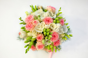 Wedding bouquet of bright flowers and empty space for text