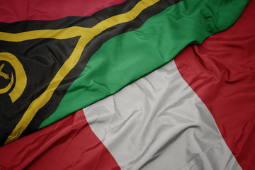 waving colorful flag of peru and national flag of Vanuatu .