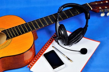 Guitar is a musical instrument for inspiration and uplift of the artist. Notepad for composer's...