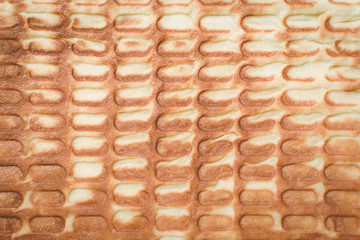 Cooked fried waffle. The background.