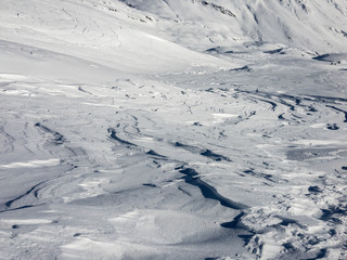Ripples of snow worked by the wind in the high mountains