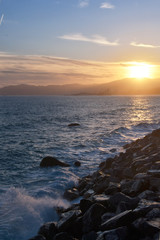 The port of Savona at sunset