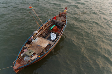 Fototapeta na wymiar Bang Pra, Chonburi Thailand - January 18,2020 : Small Fishing boat in the sea.