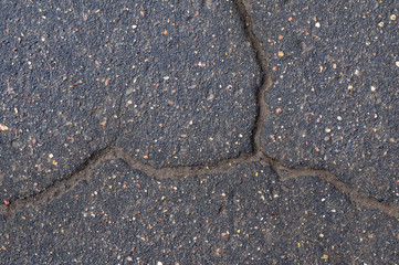 Old cracked asphalt top view