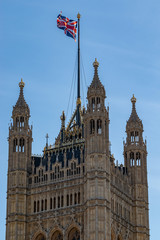Fototapeta na wymiar Great Britain flag on top of the Palace of Westminster known as Houses of Parliament, London, UK