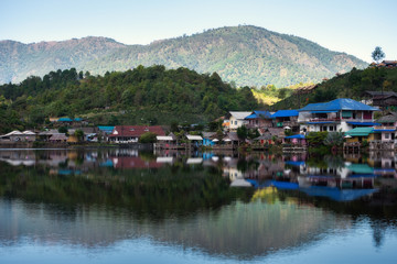 Fototapeta na wymiar village on the lake