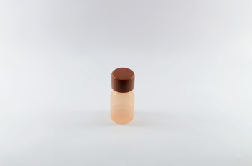 small empty brown plastic bottle