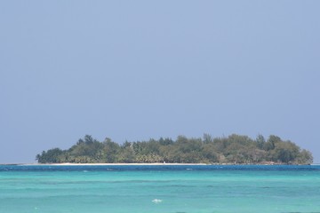 Managaha Island surrounded by blue waters of the Saipan lagoon, Northern Mariana Islands