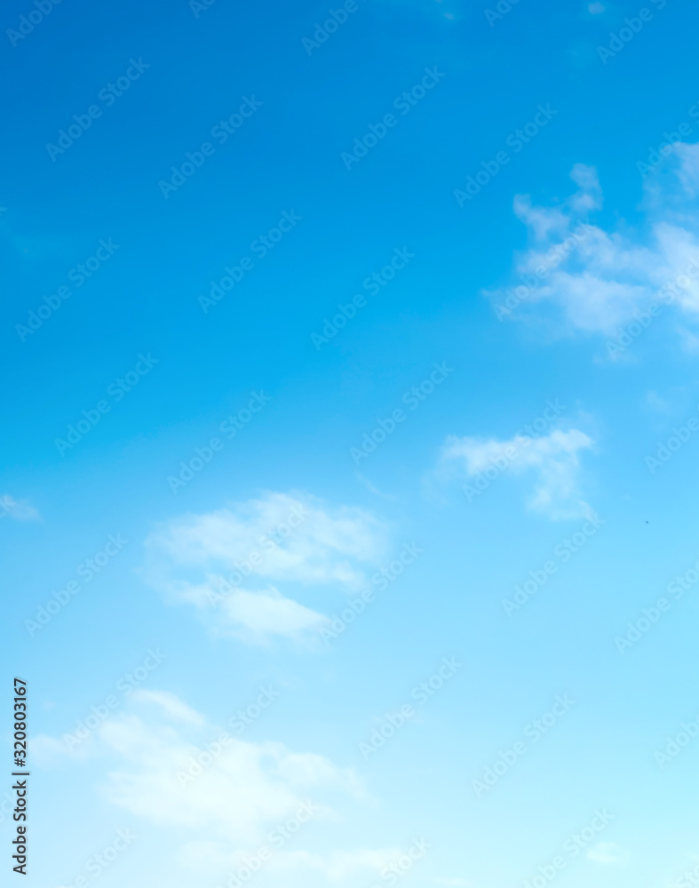 Wall mural blue sky with beautiful natural white clouds