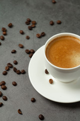 Obraz na płótnie Canvas black coffee in a white cup close-up