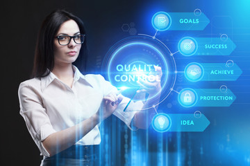 Business, Technology, Internet and network concept. Young businessman working on a virtual screen of the future and sees the inscription: Quality control