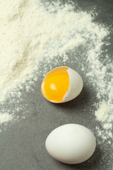 broken egg and flour closeup