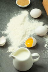 baking ingredients: sugar, milk, eggs and flour and baking tools