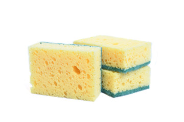A yellow kitchen sponge isolated against white background in different poses.