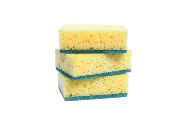 A yellow kitchen sponge isolated against white background in different poses.