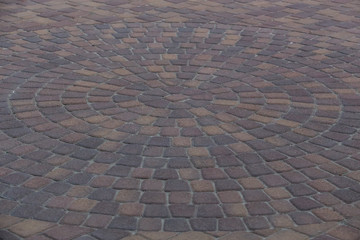pavement of rough granite tiles
