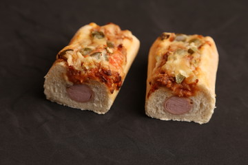 hot dog with cheese and pepper