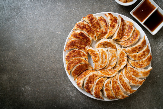 Fried Gyoza Or Dumplings Snack With Soy Sauce