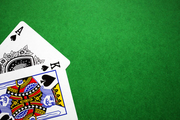 cards winning combination, ace king on a green background close-up