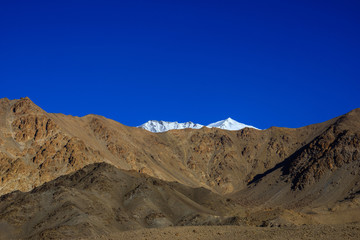 Snow mountain behide rock mountain in leh-Ladakh