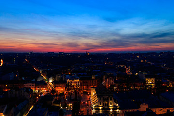 Aerial night view of the old town of Lviv in Ukraine. Lvov cityscape. View from tower of Lviv town hall