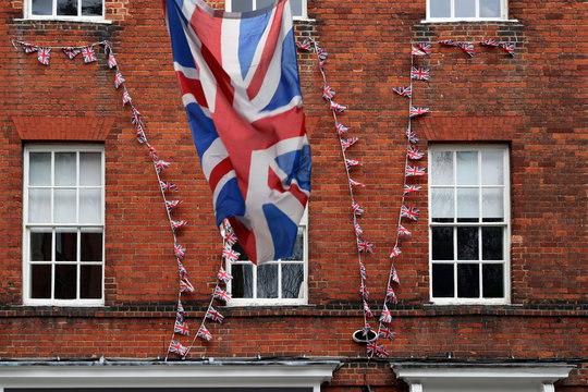 union flag and bunting at brick house