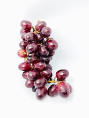 bunch of red grapes isolated on white