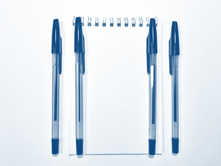 opened notebook paper with pen. PANTONE Blue, Classic Blue, Phantom Blue