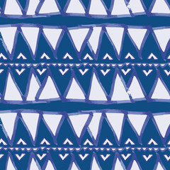 Vector seamless pattern ethnic indigo watercolor with white and blue triangles and blue background.