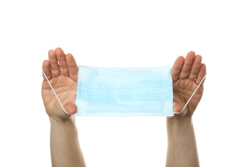Hands holding medical protective mask isolated on white background. Сoronavirus protection