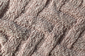 Fine textured and voluminous fabric in pink. Embossed textile pattern, pleasant to the touch and delicate, velvety and textured background for design and decoration.