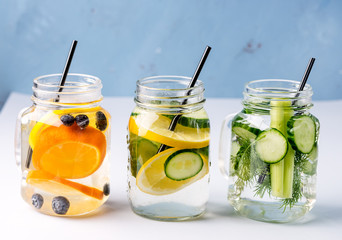 Glass Jars of Fresh Infused Water Made With Organic Fruits Vegetables and Berry Healthy Detox Drink Horizontal