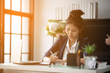 A business woman with a desk in the morning