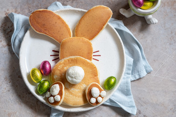 Easter funny bunny pancakes with chocolate eggs