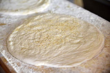 pastry dough covered with sesame