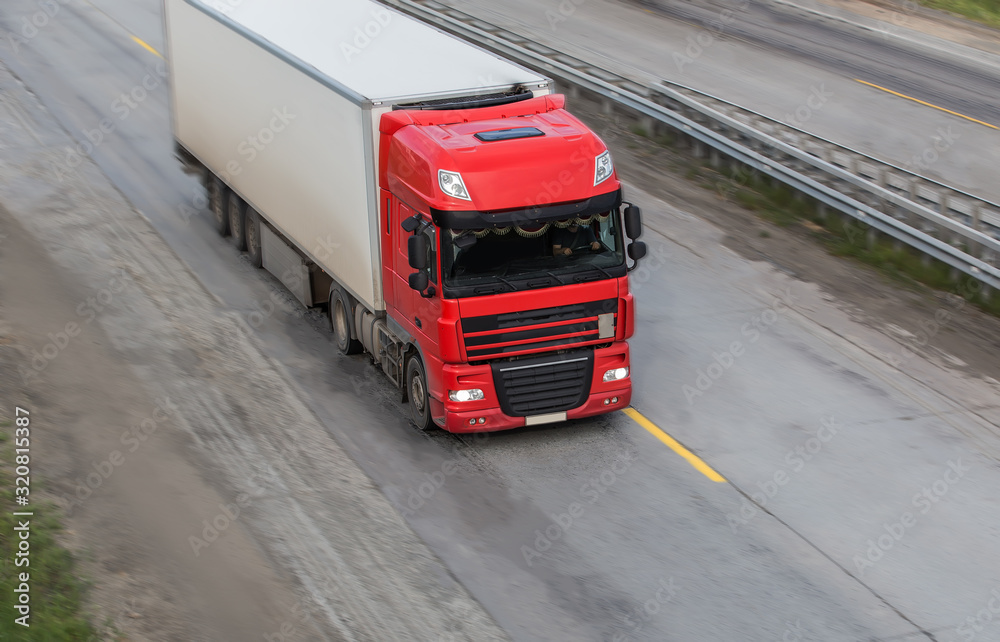 Poster powerful truck moves on highway