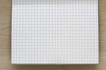 blank striped notebook white paper line pattern on wood table