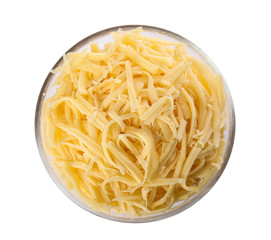 Glass bowl with grated cheese isolated on white, top view