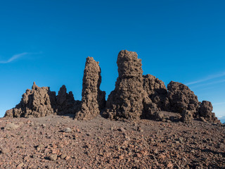 Fototapeta premium Lava rock formation at top Roque de los Muchachos mountain peak in Caldera Taburiente La Palma at Canary Islands