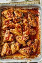 Barbecue chicken wings. Sticky asian spicy wings with teriyaki. ven baked marinated chiken