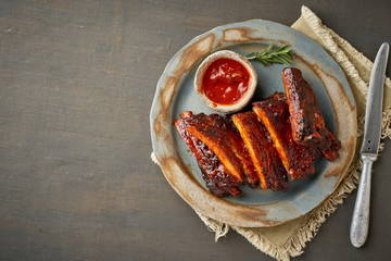 Keto food, spicy barbecue pork ribs. Top view, copy space