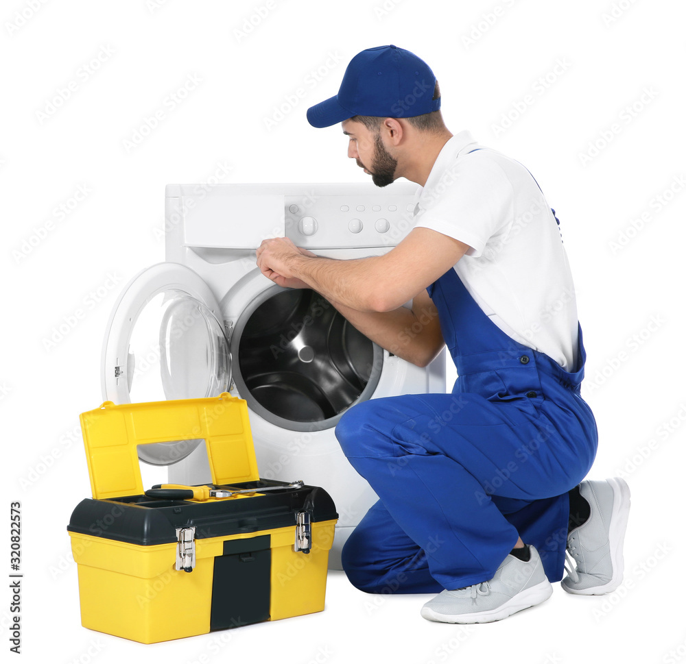 Sticker plumber repairing washing machine on white background