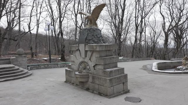 The resort town of Zheleznovodsk, a sculpture of an eagle spread its wings, as well as a drained fountain with a sculpture of Samson