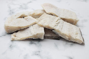 salted dry cod fish on gray backgrpound
