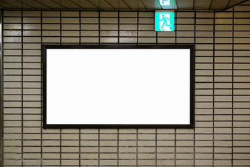blank advertising billboard and emergency exit sign at airport,Mock up Poster media template Ads display in Subway station escalator
