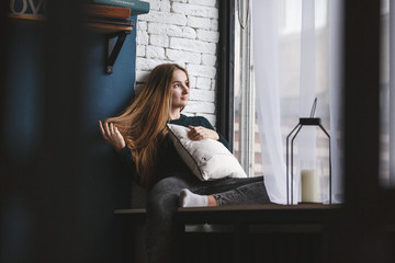 Beauty woman with white perfect smile looking at camera at home